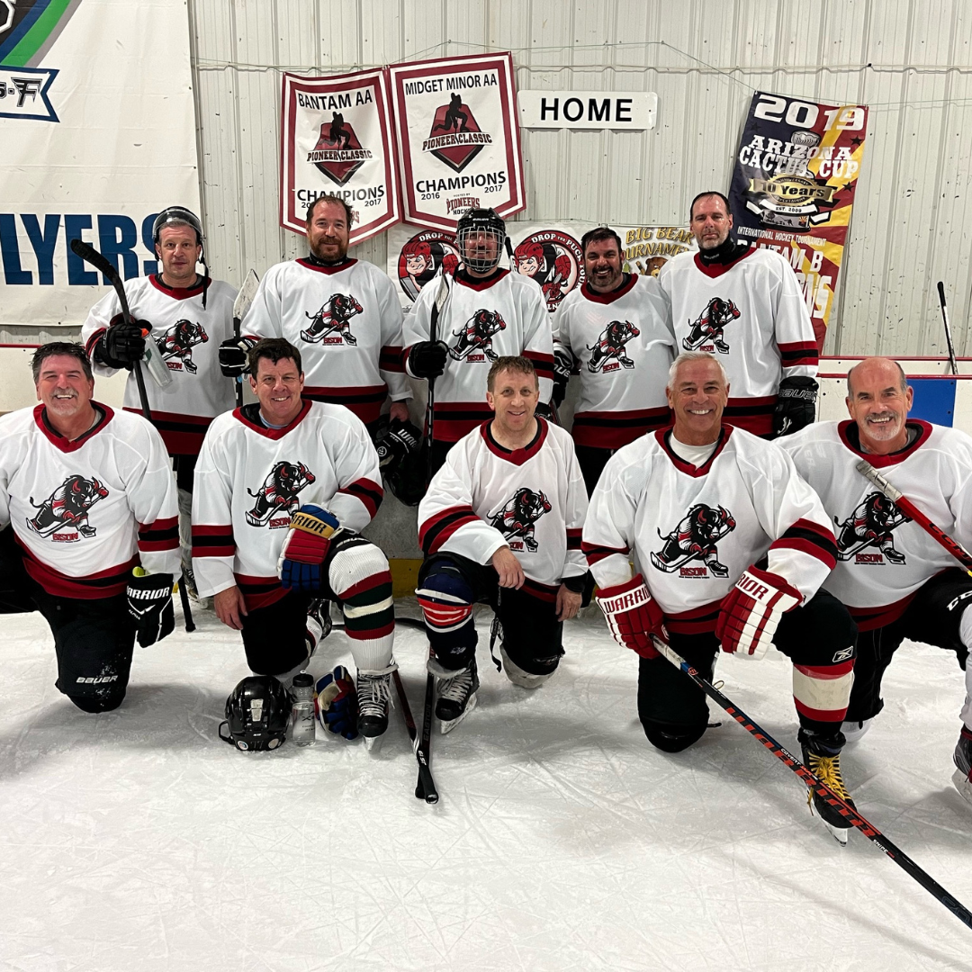 Beer league team photo of custom hockey jerseys made using our basic hockey jersey customizer